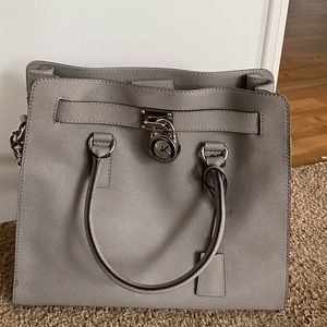 Michael Korea’s gray tote bag